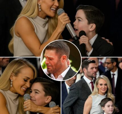 “You Are My Hero Dad” – That’s what Carrie Underwood’s son whispered, barely above a breath, just before stepping onto a modest school stage bathed in soft light. No roaring crowd, no TV cameras