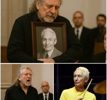 The chapel fell into a reverent hush when Robert Plant quietly stepped forward at Charlie Watts’ funeral, dressed in a simple black suit with his iconic golden curls tied loosely back, and stood beside the…