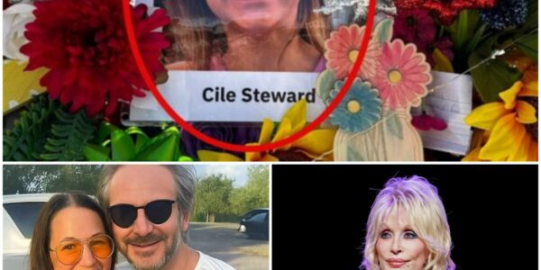 BREAKING: Dolly Parton met the parents of the last girl found at Camp Mystic — but when they hugged their daughter, something *inhumanly cold* clung to her back. Only later, under the light, did they *see it*. Full chilling photo in comments.
