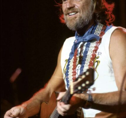 This afternoon, London’s hospital halls fell unusually silent as Willie Nelson quietly arrived, carrying the same old guitar that had followed him through decades.
