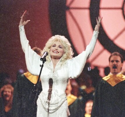 Dolly Parton and “He’s Alive”: A Story of Faith, Power, and Redemption