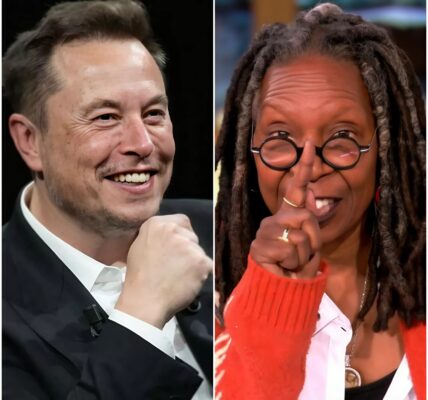 LIVE TV SHOWDOWN: During a heated segment, Whoopi Goldberg turned to Elon Musk and sneered, “Without Tesla, you’d be nothing.” The audience let out a collective gasp, the studio fell silent, and cameras caught Musk’s expression shift from amused to razor-sharp. Then, in perfect calm, he delivered 7 cutting words that not only silenced Whoopi but had the entire panel stunned — and the crowd on their feet. Social media exploded within minutes, with fans calling it “the most savage comeback of the year.”