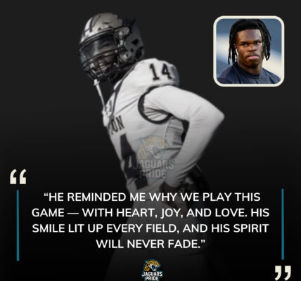 “Full of energy, always smiling” — that’s how friends and teammates are remembering the Denton High football player whose sudden passing has left the community in shock. Travis Hunter, visibly emotional, shared that the boy once inspired him with his fearless spirit on the field and kind heart off it. “He reminded me why we play this game,” Hunter said — words that now echo as a heartbreaking tribute to a life gone too soon.