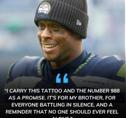 In the recent game between the Seahawks and Saints, many fans noticed Geno Smith carried a tattoo of the ‘988’ Suicide & Crisis Lifeline — and after the win, through trembling words, he dedicated the victory to his late brother, before pledging $988,000 with the message: ‘Everyone deserves to live surrounded by love and support.’