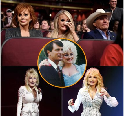 “Are you listening, love?” Dolly Parton’s voice trembled, carrying across the hushed room as if reaching straight to the heavens, searching for the man who had been her anchor for over fifty years.