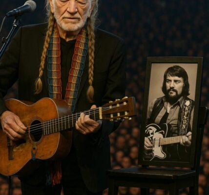No one could have anticipated the weight of that night. When Willie Nelson stepped onto the stage, Trigger in his hands, the crowd felt this would not be an ordinary show. He sang a song once shared with Waylon Jennings — but this time, the harmony was gone. The stool beside him sat empty, silence filling the space where a voice used to be. It wasn’t just a concert; it was a farewell. As the final chord faded, Willie rested his hand on the empty stool and whispered something the microphone barely caught. The words lingered in the air, leaving the crowd certain there was more to Waylon’s story than anyone had ever been told.
