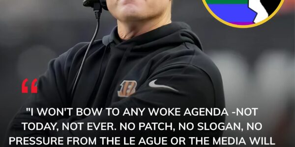 LATEST NEWS: Cincinnati Bengals head coach Zac Taylor has stunned the sports world after refusing to wear a rainbow-themed patch meant to show solidarity with the LGBTQ community during a major NFL media event. Instead, Taylor delivered a blunt statement denouncing what he called the league’s growing “political theater,” declaring that he would “never use football as a platform for agendas.” The move has instantly divided fans across Cincinnati, the NFL, and the nation — with some praising his courage to stand by his principles, and others accusing him of intolerance in a league striving for inclusion.