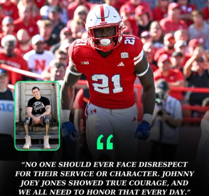 BREAKING: Nebraska’s Emmett Johnson Stands with Decorated Marine Johnny Joey Jones After Luxury Hotel Controversy