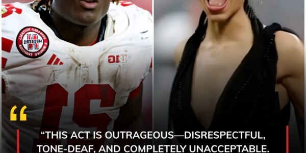 Outrage Erupts as Emmett Johnson Condemns Controversial National Anthem Performance