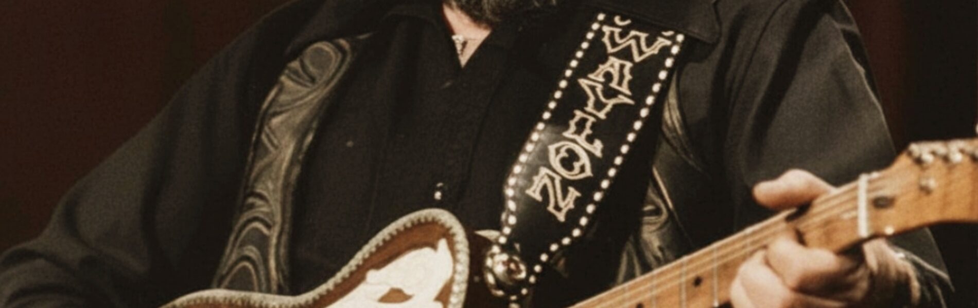 Six Strings Away – Waylon Jennings: A Lonely Song, Played in the Key of Goodbye
